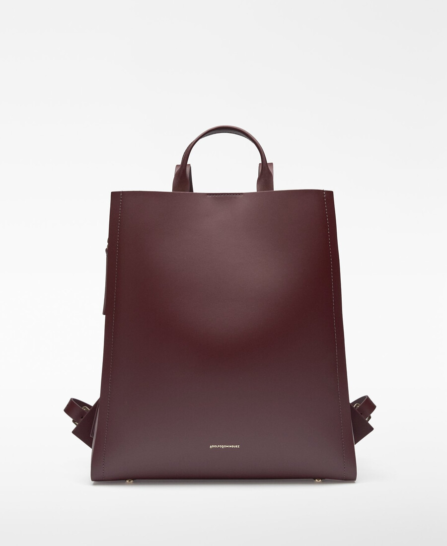 frau mit glimmerrucksack